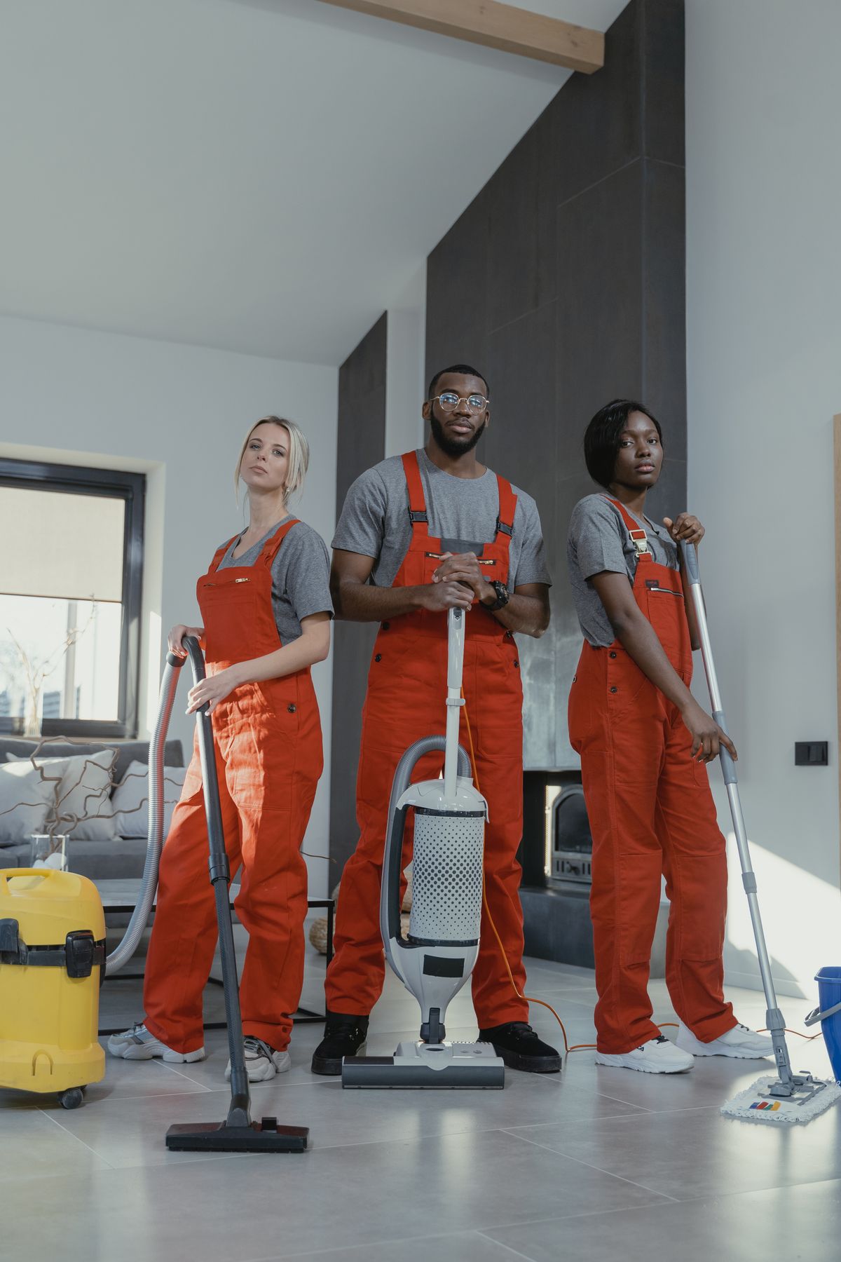Cleaning crew working together in a client space